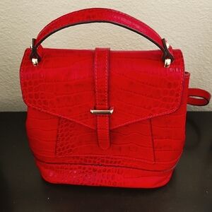 Divinity Renizia red leather cross body purse made in Italy. 11x9..